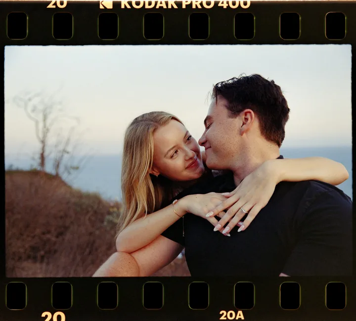 Film-framed photograph of Kayley and Jack kissing